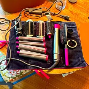 Dyson Airwrap with extra long barrels. All attachments. Ex condition $550